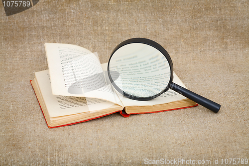 Image of Still-life from a magnifier and book