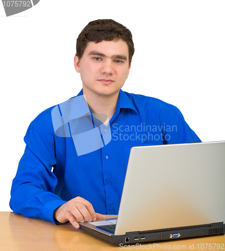 Image of Young man working for laptop