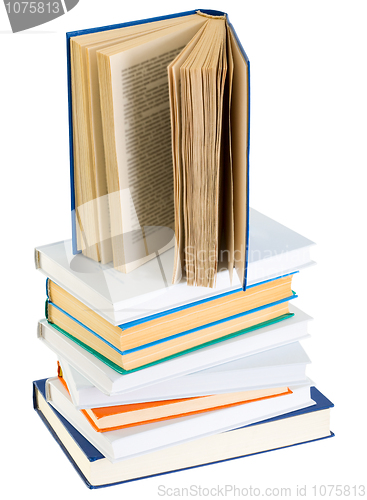 Image of Pyramid from books with color covers on a white background