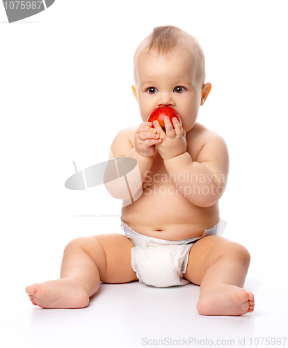 Image of Little child with apple