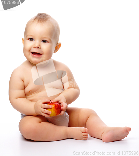 Image of Little child with apple