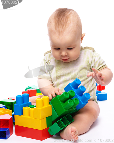 Image of Little boy with building bricks