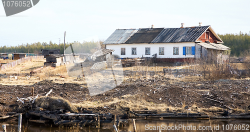 Image of The old crooked rural wooden house