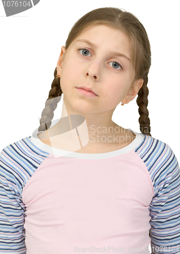 Image of Little girl in a T-shirt on a white background