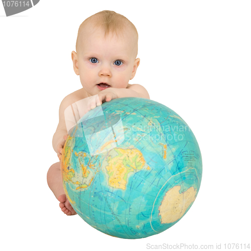 Image of Baby with geographical globe isolated on white