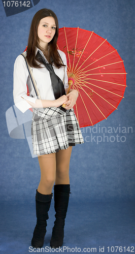 Image of Young woman with the Japanese umbrella in a hands