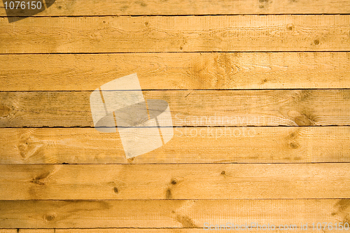 Image of Wooden crude uneven wall background
