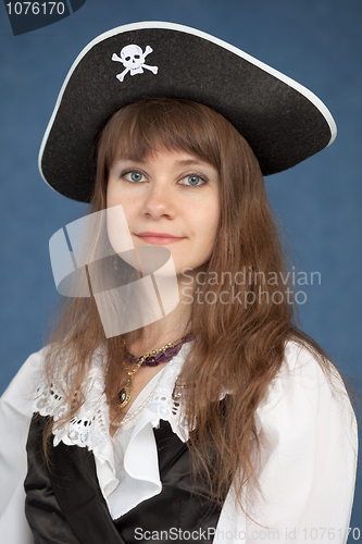 Image of Portrait of pirate girl in black hat