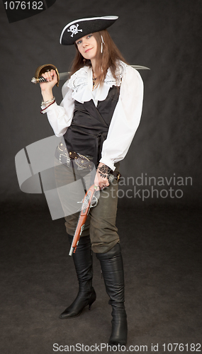 Image of Beautiful girl - pirate with sabre and pistol