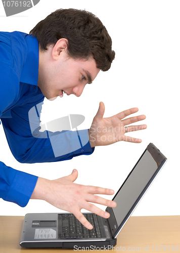 Image of Man emotionally communicates with the laptop