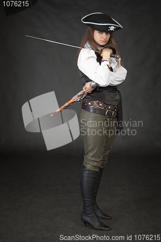 Image of Girl - pirate with sabre and pistol on a black