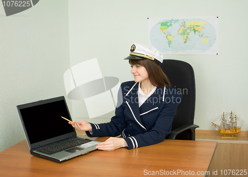 Image of Woman  with laptop at office