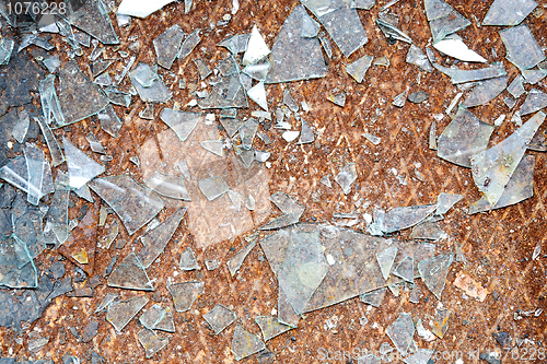 Image of Rusty old metal floor and glass