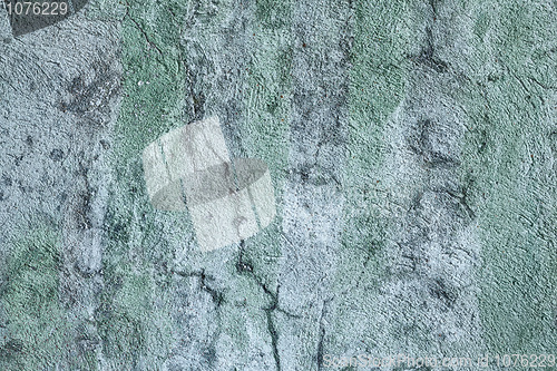Image of Wall covered with an old green paint