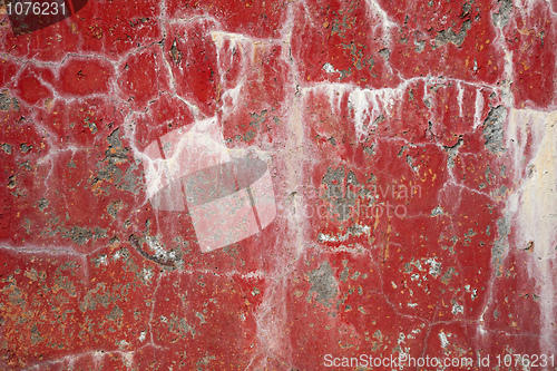 Image of Red dirty cracked wall background with stains