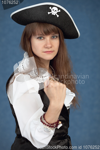 Image of Serious girl in costume of sea pirate