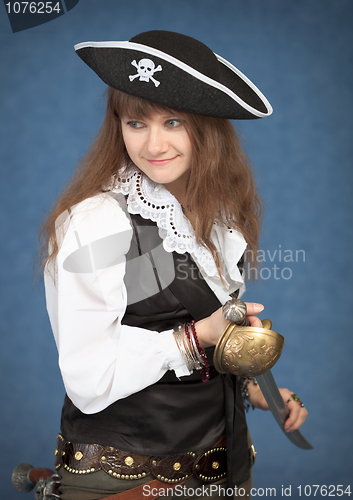Image of Beautiful girl - pirate on blue background