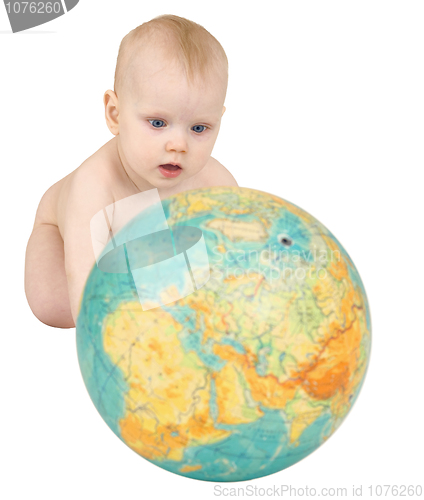 Image of Baby with geographical globe isolated on white