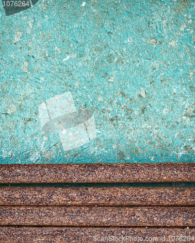 Image of Rusty water pipes against dirty wall grunge background