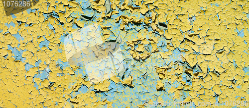 Image of Old dirty cracked yellow wall of ruins