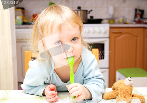 Image of Child with a spoon