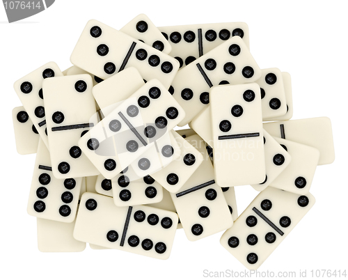Image of Big heap from dominoes on white background