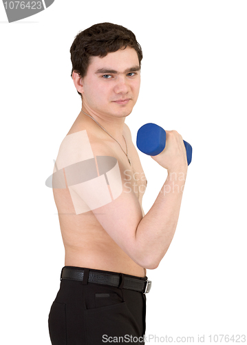 Image of Young guy with dumb-bell in a hand on white background