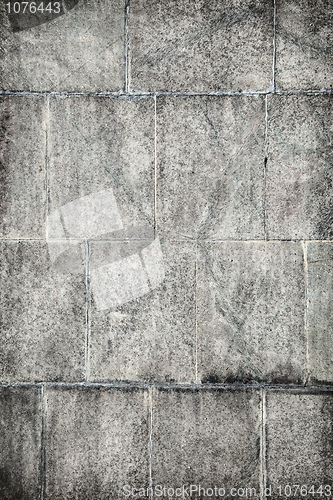 Image of Surface of old concrete wall covered with grey plates