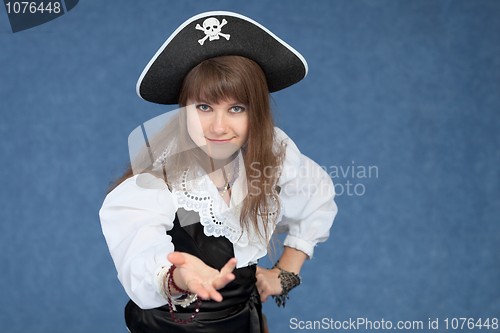Image of Affable sexy girl in suit of the sea medieval pirate on blue