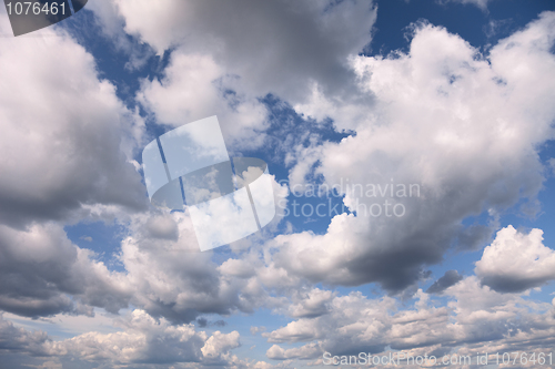 Image of Summer blue sky covered with cumulus clouds