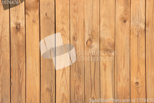 Image of Wall covered with pine wooden boards