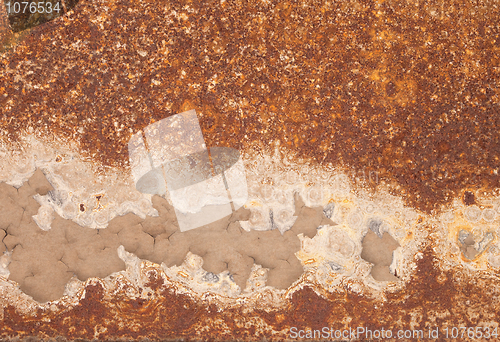 Image of Rusty iron with peeled paint and corrosion stains background