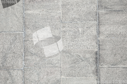 Image of Surface of old concrete wall covered with grey plates