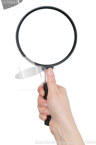 Image of Female hand holds big magnifier isolated on white background