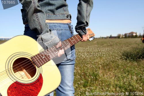 Image of Woman guitar player