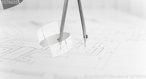 Image of Compasses and drawing close up