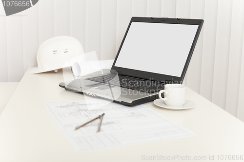 Image of Office workplace of engineer - designer with laptop