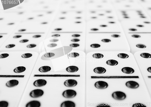 Image of Surface covered with gray dominoes bones