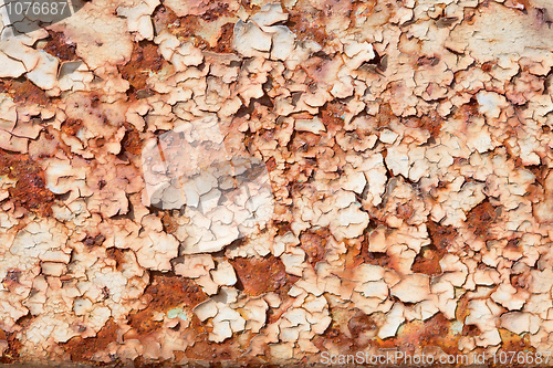 Image of Rusty steel sheet with peeled paint and corrosion stains