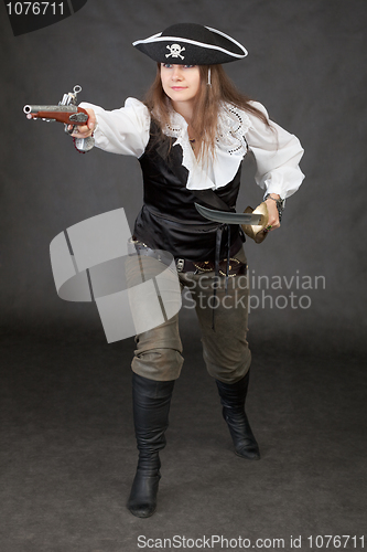 Image of Attacking pirate armed with sabre and pistole