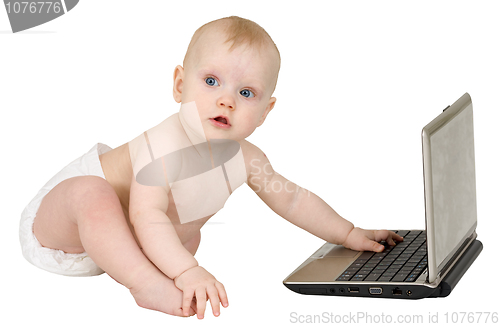 Image of Small nice child with laptop isolated on white background