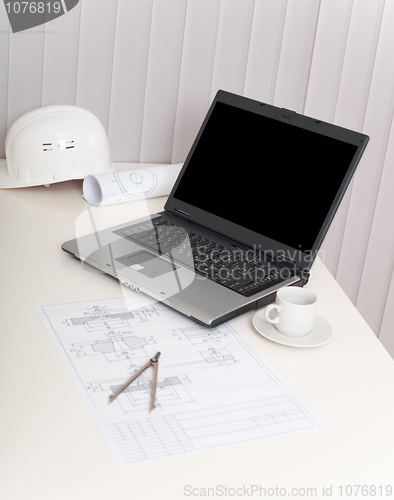 Image of Workplace of engineer with laptop