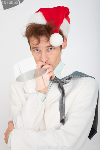 Image of Portrait of man in Christmas hat
