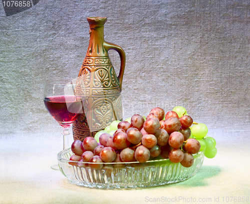 Image of Still-life with clay bottle, grapes and glass on canvas