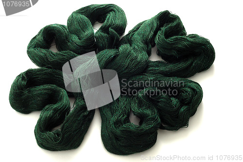 Image of Green knitting yarn in shape of clover leaf