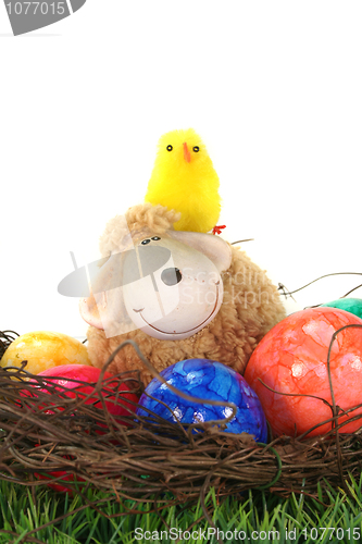 Image of Easter basket with eggs, sheep and chicks