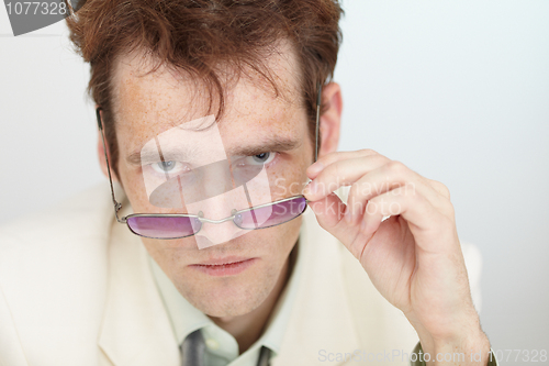 Image of Serious sight of young man close up