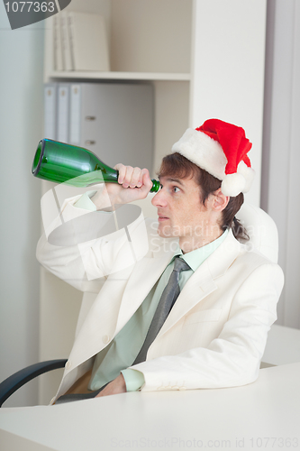 Image of Businessman in white jacket celebrates Christmas