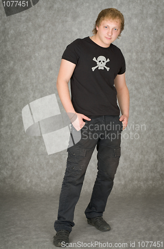 Image of Man in a T-shirt with pirate symbolics