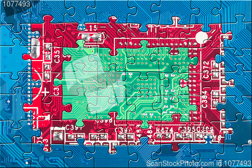 Image of Electronic circuit puzzle background in blue, red and green colo